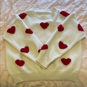 Cozy White Sweater with Red Heart Accents